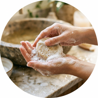 Lather the bar between your hands or directly over the body.